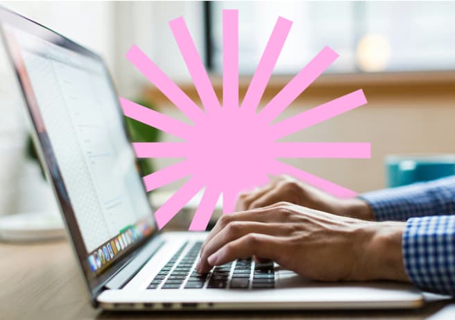 person typing on a laptop